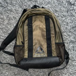 Reebok green and black backpack